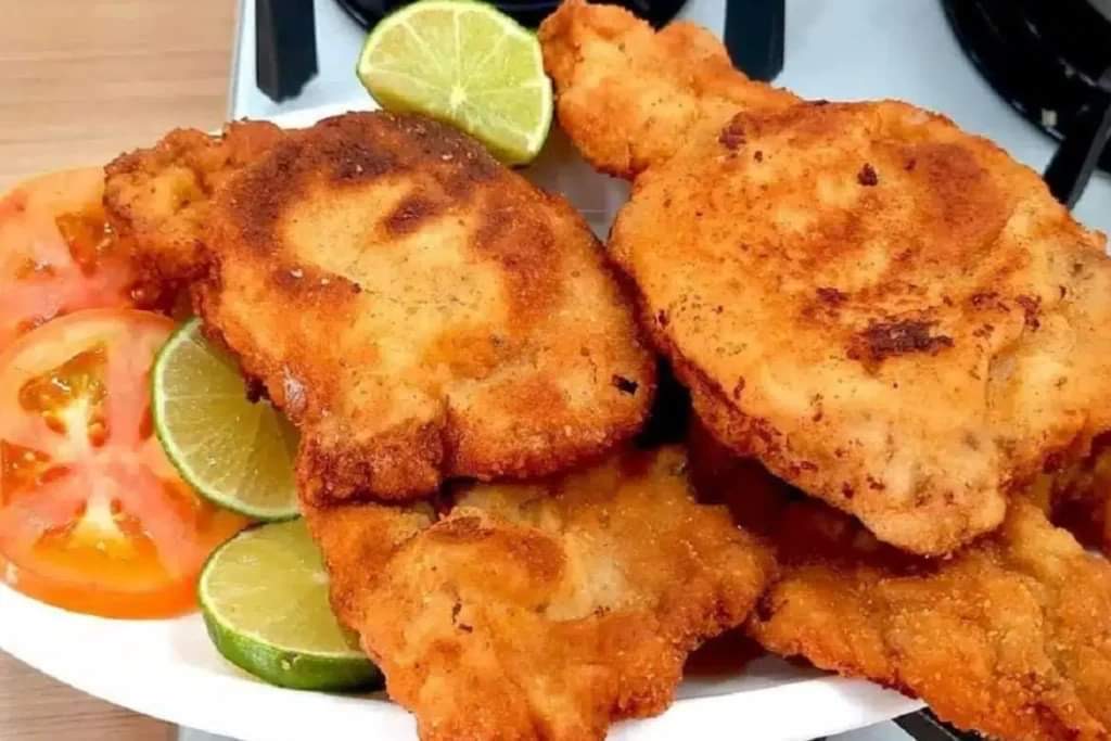 Como fazer uma bisteca suína à milanesa